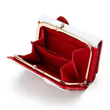 Stylish Kuromi wallet for anime fans with a spacious red interior and chic gold accents