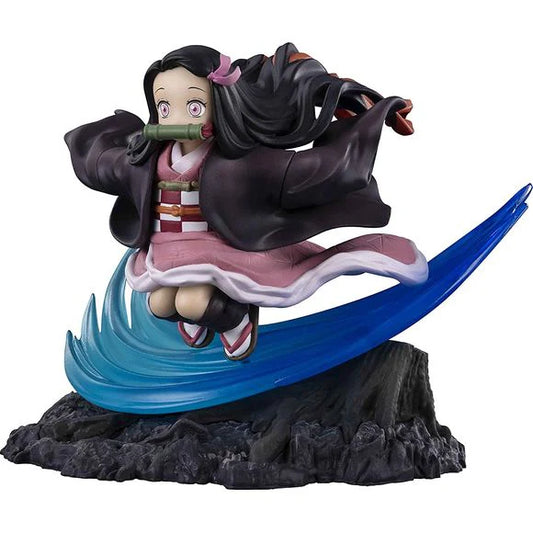 Nezuko figure Bandai Spirits with flowing black hair and pink kimono on blue energy base