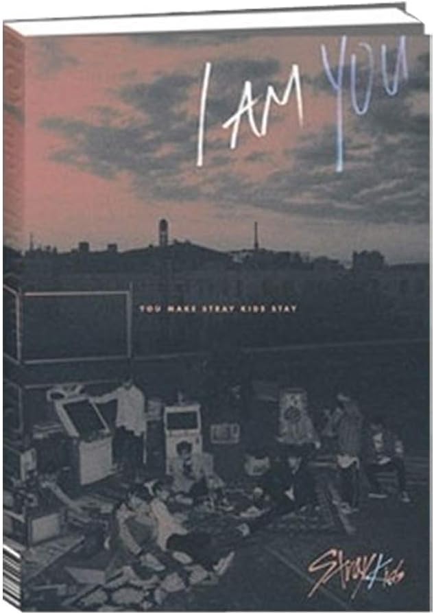 Stray Kids merch I Am You photobook featuring group photos and inspiring messages for fans