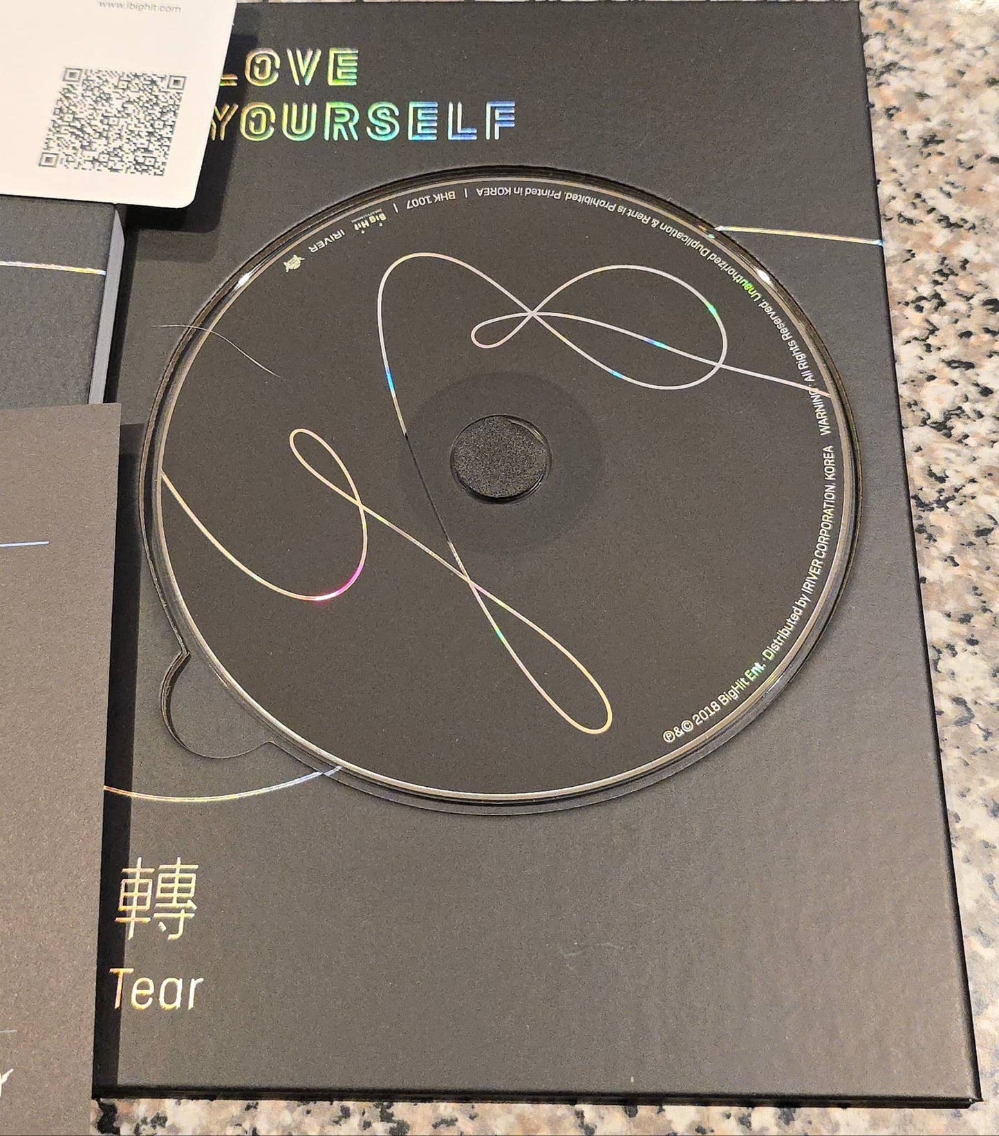 BTS Love Yourself Tear Y Version album CD with minimalist design and colorful accents