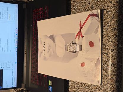 Esquire BTS cover for sale featuring a stylish Cartier watch and elegant white packaging