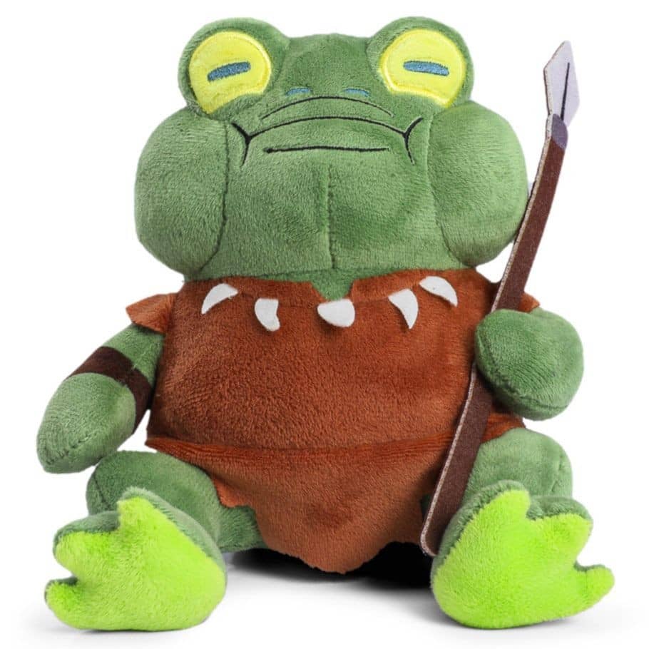 Green WizKids plush figure of a frog character from u n b l o c k e d games with a spear accessory