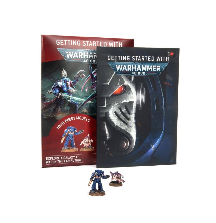 Warhammer 40k starter set with book and two detailed miniature figures for tabletop gaming