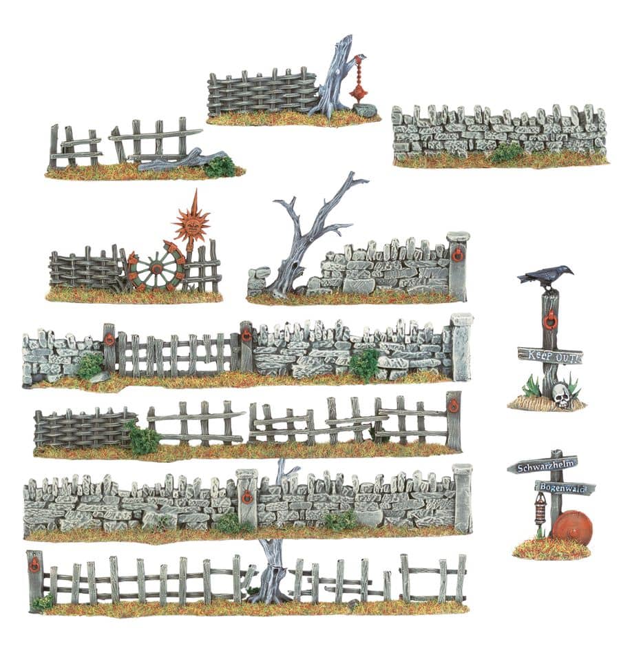 Warhammer Old World terrain set featuring detailed miniature fences, stone walls, and signposts for tabletop gaming